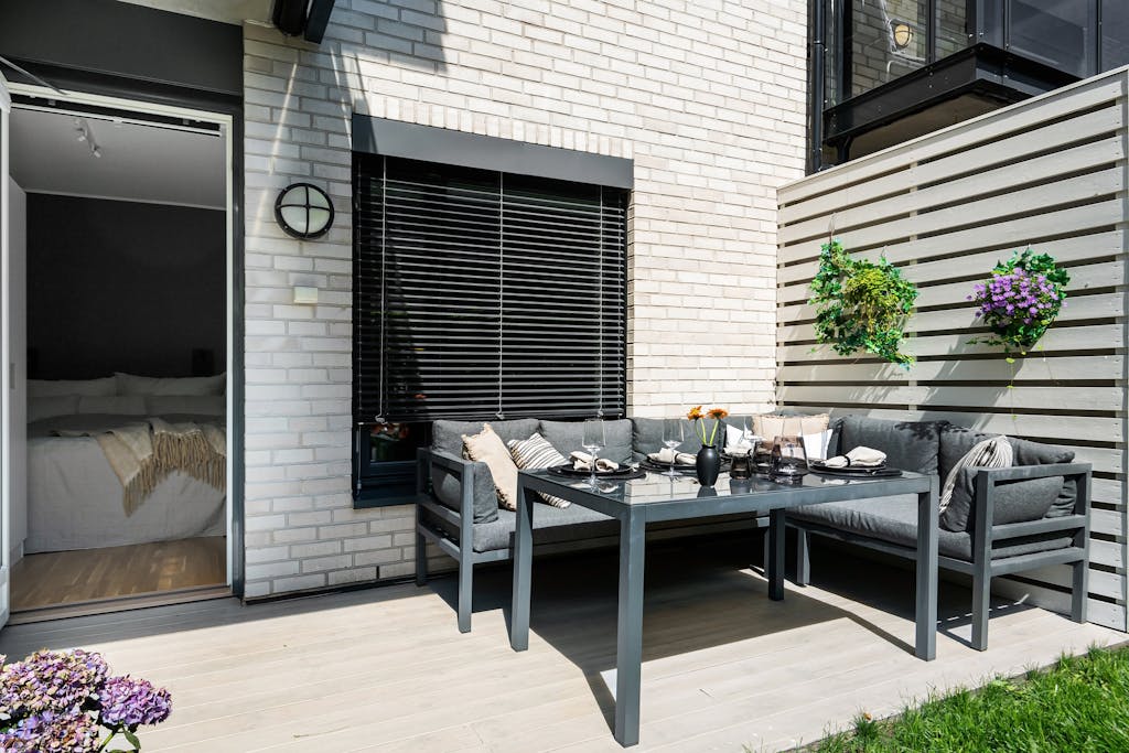 View of a Modern, Furnished Patio in an Apartment Building